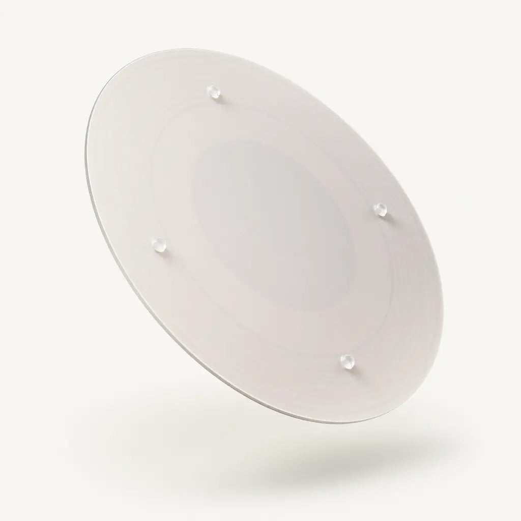 Alorivo tempered glass cutting board backside showing four anti-slip silicone feet, frosted glass texture, floating on warm white background with soft gradient shadow.