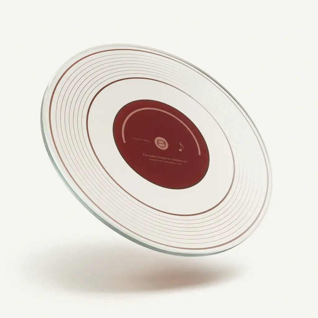 Alorivo round tempered glass cutting board with vinyl record design, featuring concentric groove texture and burgundy center label, floating on warm white background with soft shadow, minimalist product photography.