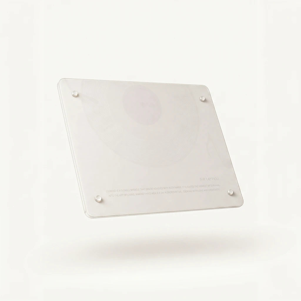Reverse side of the Alorivo tempered glass cutting board showing transparent non-slip silicone feet and minimalist brand labeling.